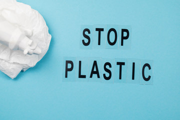 Fototapeta na wymiar Concept of stop plastic pollution, global warming, recycling plastic, plastic free. White bear,plastic bag on blue background