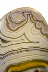 Macro of natural mineral rock on white background close up