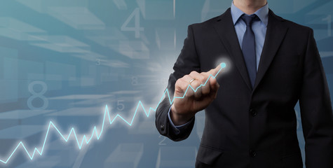 business man showing growth rate