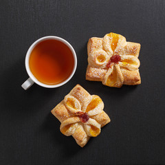Tea and buns with jam
