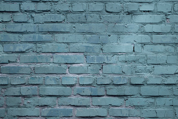 blue gray loft style background with building brick texture.