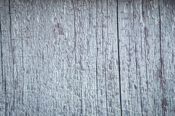 Old wood, exposed to weather conditions, the cracked,cracked,sun-bleached.