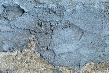 Old wood, exposed to weather conditions, the cracked,cracked,sun-bleached,concrete.