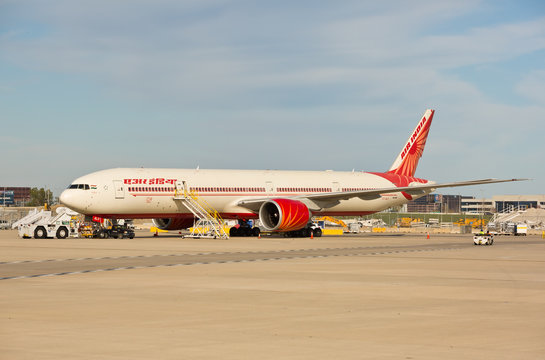 Chicago, USA - October 14, 2019: A Boeing 777-300 aircraft of Air India Airlines being serviced at O'Hare International Airport.