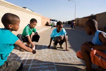 Boys playing on street