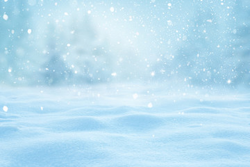 Winter  background with snow and blurred bokeh.Merry Christmas and happy New Year greeting card with copy-space.