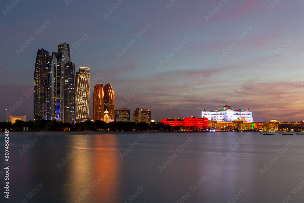 Wall mural Abu Dhabi skyline at night, modern cityscape