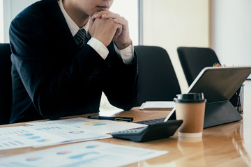 Businessman analyse investment marketing data.