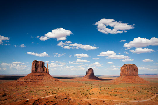 Midday light at Monument Valley, an iconic road trip stop in Arizona