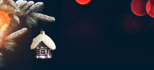 Vintage Christmas Toy In The Form Of a House On a Colorful Background On The Christmas Tree