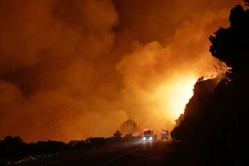 Firefighters battle a blaze in Kalk Bay near Cape Town
