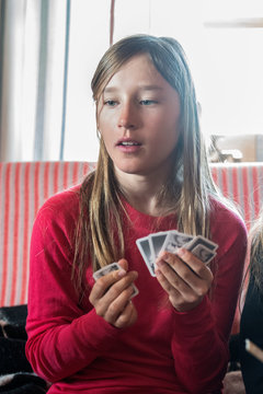Girl playing cards