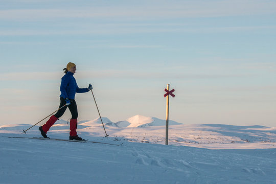 Woman cross country skiing