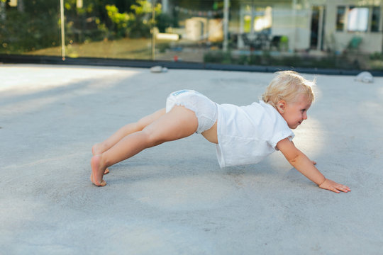 Toddler doing push ups