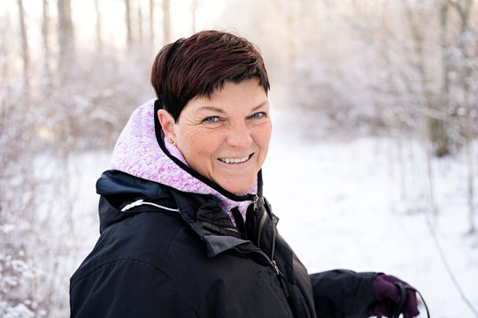 Smiling woman at winter
