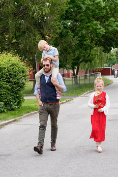 Father walking with children