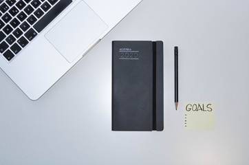 Planning 2020 agenda.  time to schedule and organize the new year calendar diary to achieve goals.