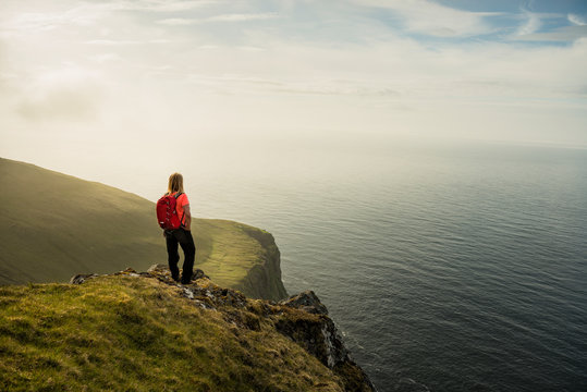 Hiker looking at view