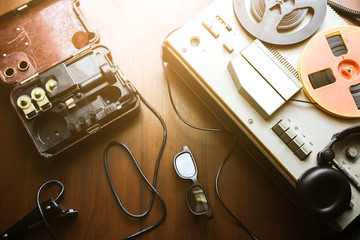 Reel tape recorder for wiretapping. Field telephone set USSR is lying nearby.  KGB spying...
