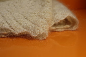 woolen shawl on an orange background