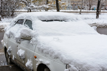 Car Covered In Fresh White Snow, Cars covered in snow after a blizzard.