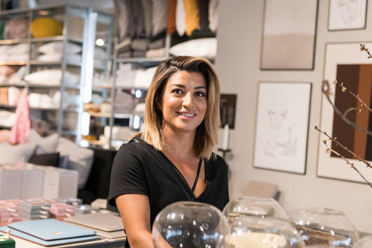 Smiling woman in shop