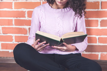 woman reading book