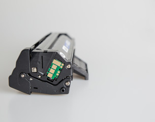 London, England, 10/09/2019 Black Laser Toner Cartridge for modern printer technology, Isolated one a white background shot professional in a studio. Modern engineering and technology for household