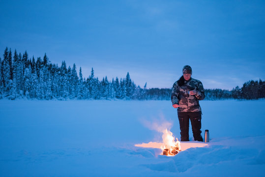 Woman camping at winter