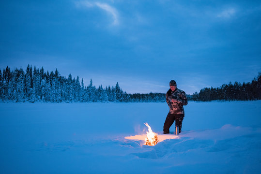 Woman camping at winter