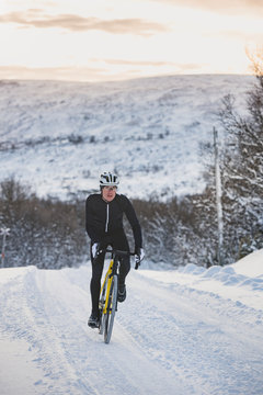 Man cycling at winter