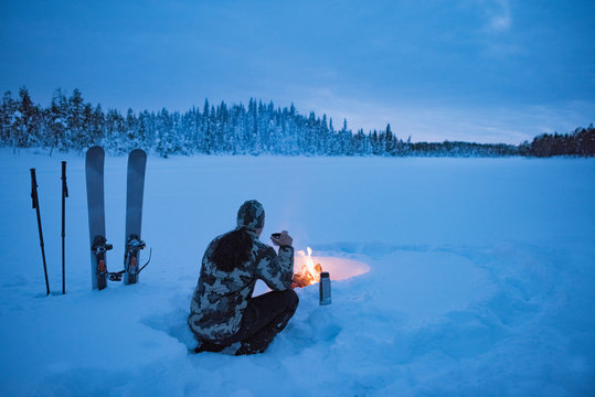 Woman camping at winter