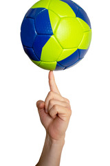 handball ball on the finger of a male hand