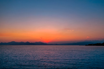 Naklejka premium Spectacular Orange Sunset over the Sea