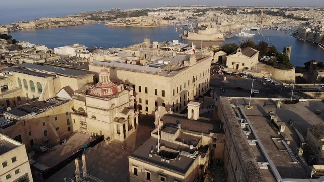 Aerial Drone Shot of Valletta - Malta's Capital City - the Grand Harbour and the Three Cities - Birgu, Senglea, Bormla
