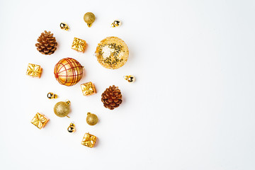 christmas golden background, christmas decoration, cones, balls, glitter, flat lay
