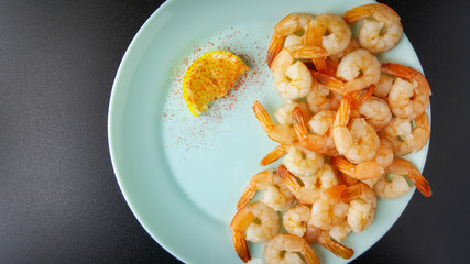 Fresh delicious boiled peeled shrimp. Cooked seafood.