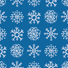 Fototapeta na wymiar Seamless background of hand drawn snowflakes