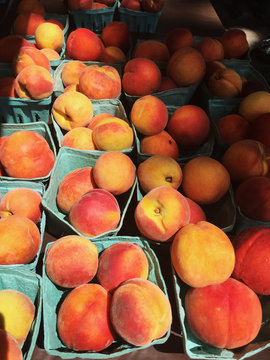Peaches in cartons at Farmer's Market