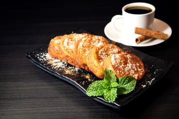 Rabanadas Brazilian dessert with coffee. Traditional Christmas breakfast.