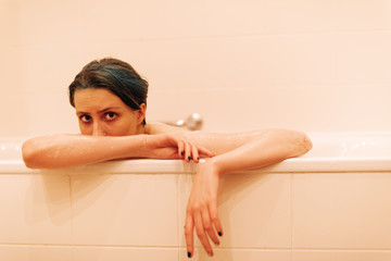 Young Androgyne Woman In Bath