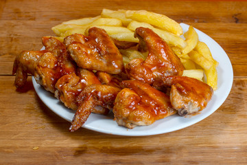 Take-Away foods on Orange vibrant background colour and wood