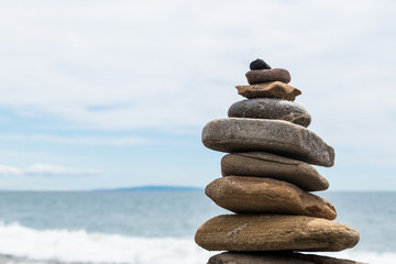 Balansed Stacked stones on the beach