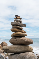 Balansed Stacked stones on the beach
