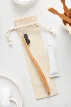 Wood toothbrush with paste in layout