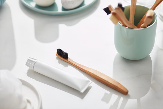 Wooden toothbrushes with toothpaste