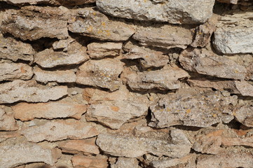 texture of the wall of old stones for the background