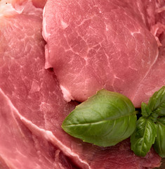  raw pork on a wooden board