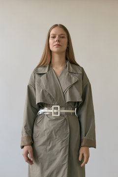 Young Woman In Trench Coat