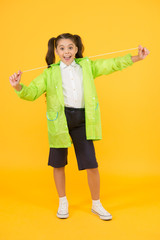 Invest in durable kids rainwear to keep children out in fresh air. Waterproof concept. Small...